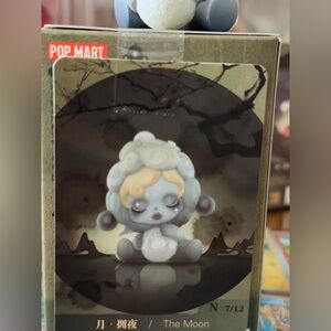 Skull panda figurine